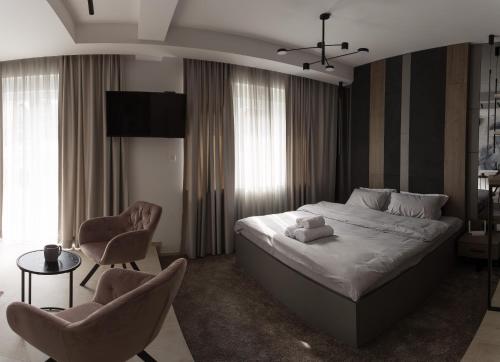 Ένα ή περισσότερα κρεβάτια σε δωμάτιο στο Prime Apartment Kragujevac