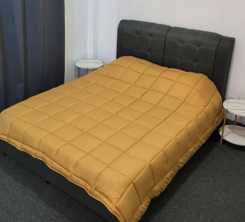 Ένα ή περισσότερα κρεβάτια σε δωμάτιο στο CASA VENICIA CONDO BATU CAVES