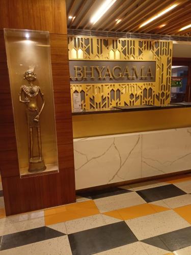 a museum display with a statue of a fifaraoh at Abhyagama Hotel in Digha
