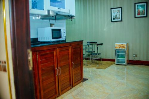 Kuchyň nebo kuchyňský kout v ubytování Hera Hotel Kampala