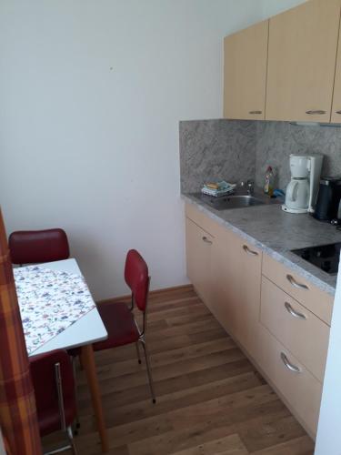 Η κουζίνα ή μικρή κουζίνα στο Gasthaus Rehwinkel
