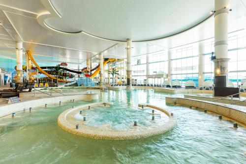 an indoor water park on a cruise ship at Sono Belle Cheonan in Cheonan