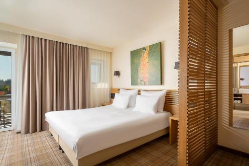 Letto o letti in una camera di Ana Hotels Sport Poiana Brasov