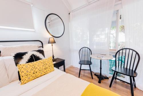 Cama o camas de una habitación en Port O' Call Motel