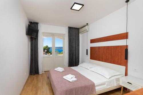 Postel nebo postele na pokoji v ubytování Apartment Meira br3