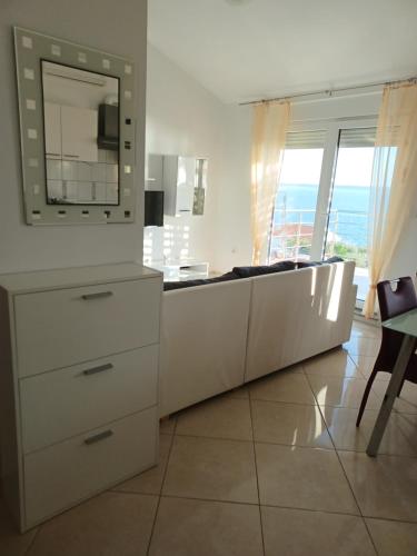 Fotografia z galérie ubytovania Apartmani Sunčev sjaj v destinácii Rtina