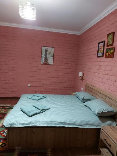 Ένα ή περισσότερα κρεβάτια σε δωμάτιο στο MUSAVVIR