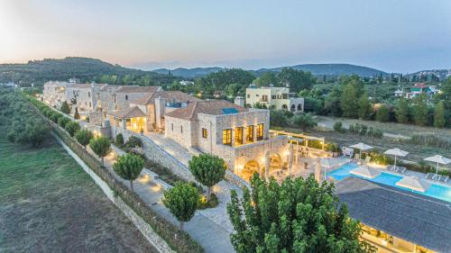 an aerial view of a large estate with a swimming pool at Castello Antico Hotel in Gythio