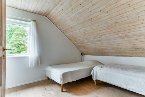 Posteľ alebo postele v izbe v ubytovaní Architect-designed house in Jarna with fantastic views