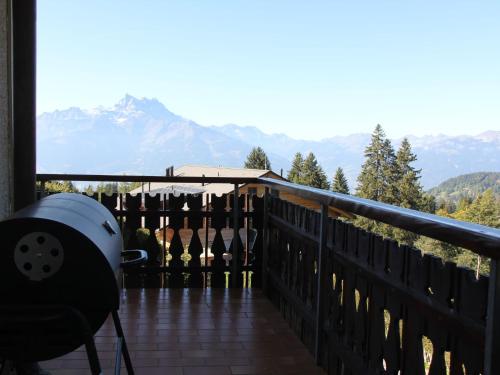 a balcony with a view of the mountains at Apartment Le Bouquetin 1 by Interhome in Villars-sur-Ollon
