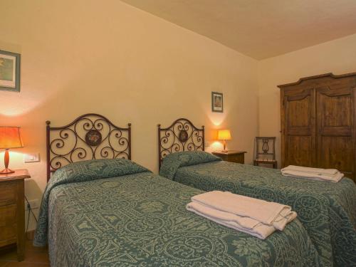 Katil atau katil-katil dalam bilik di Holiday Home Campiglia-6 by Interhome