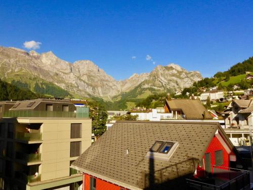 a view of a city with mountains in the background at Apartment Villa Maria 33 by Interhome in Engelberg