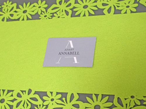 a sign on a green paper with flowers on it at Apartment Apart Annabell by Interhome in See