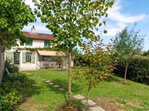 a small tree in the yard of a house at Holiday Home Le Glaude by Interhome in Chiddes