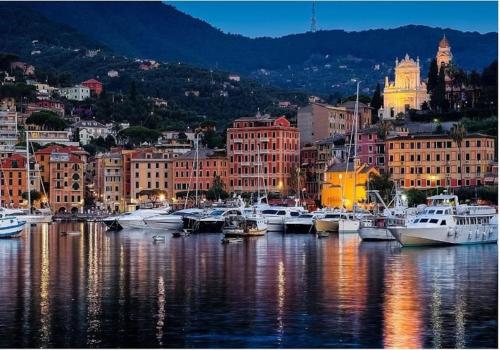 a group of boats are docked in a harbor at [Portofino] Appartamento a un passo dal mare - Free Wi-Fi in Rapallo