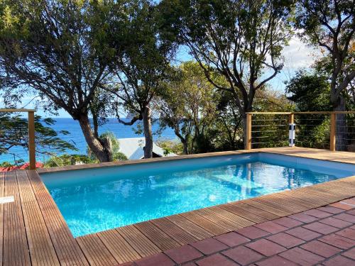 Bazén v ubytování Le Caillou *** Belle villa, 4 chambres, piscine, vue mer *** nebo v jeho okolí