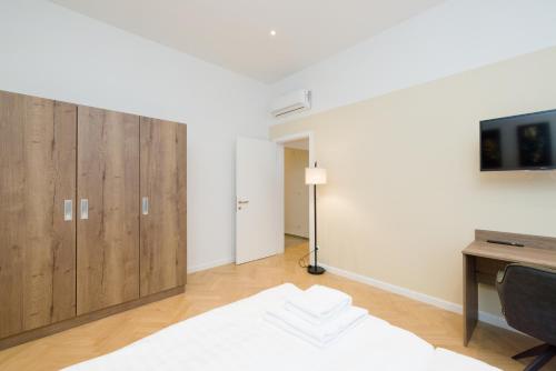Телевизор и/или развлекательный центр в Vienna Stay Apartments Pezzl 1170