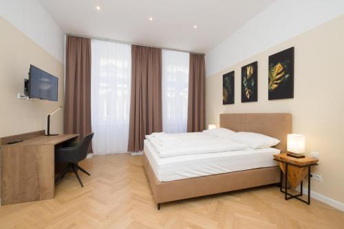 Кровать или кровати в номере Vienna Stay Apartments Pezzl 1170