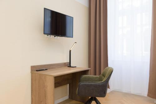 Телевизор и/или развлекательный центр в Vienna Stay Apartments Pezzl 1170