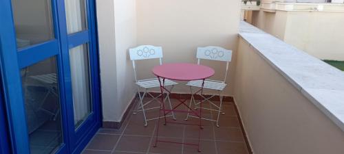 Balcon ou terrasse dans l'établissement Apartamento Fibes y Congresos