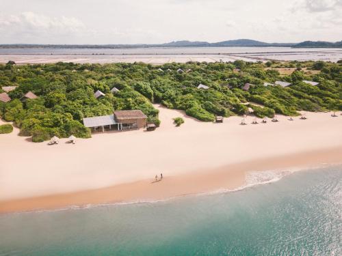 an aerial view of a beach with a house at Uga Jungle Beach - Trincomalee in Trincomalee