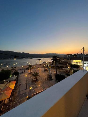 a view of a city with a river and a street at Plateia sea view loft in Samos