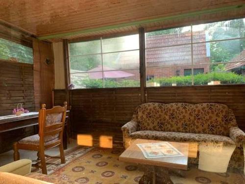 Et opholdsområde på Ferienwohnung Kastanienhof, 35165