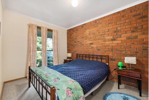 Ένα ή περισσότερα κρεβάτια σε δωμάτιο στο Lochys Rest