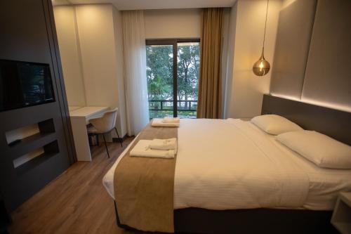 Voodi või voodid majutusasutuse SANTANA OTEL toas