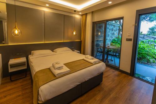 Voodi või voodid majutusasutuse SANTANA OTEL toas
