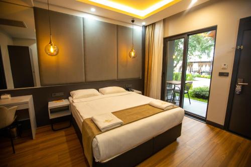 Voodi või voodid majutusasutuse SANTANA OTEL toas