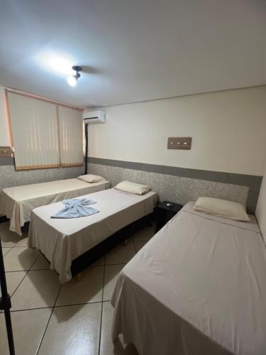 Hotel Ibirapueraにあるベッド