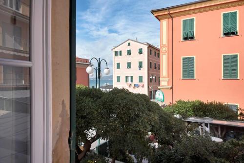 a view of a city from a window at A due passi dal mare in Chiavari