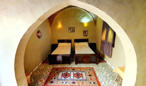Postel nebo postele na pokoji v ubytování Scorpion House Luxor