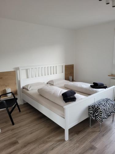 Säng eller sängar i ett rum på Quartier Mehrblick