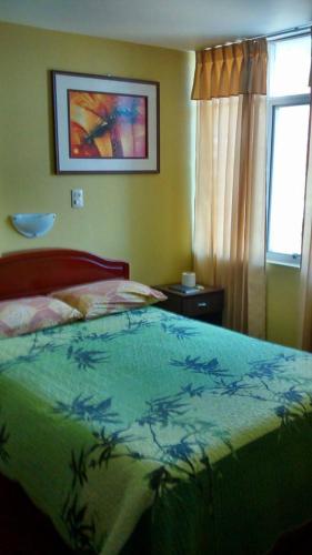 Кровать или кровати в номере Hostal Puerto Ingles