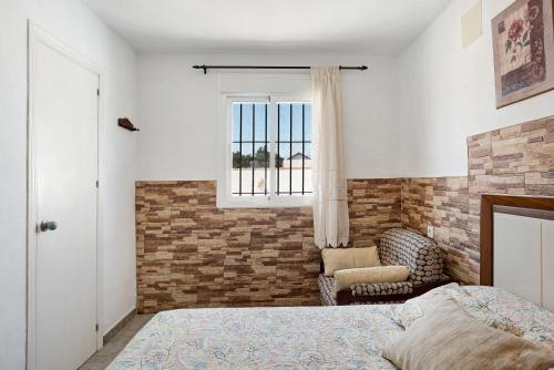 Postel nebo postele na pokoji v ubytování Casa Mari Loli 2