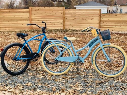 two blue bikes are parked next to each other at Inviting Bungalow Next to UNC - Free Cruiser Bikes in Greeley