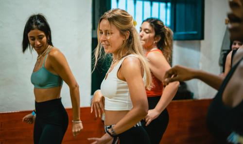 a group of women in a dance class at Viajero Hostel Cali & Salsa School in Cali