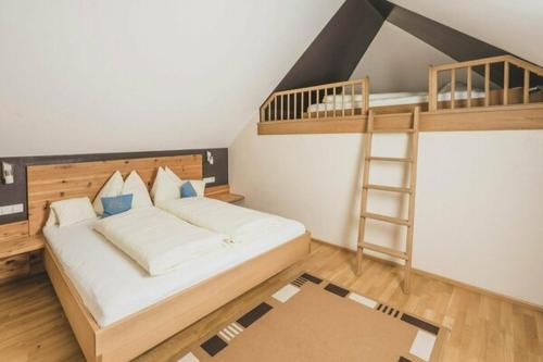 A bed or beds in a room at Haus Sylvia