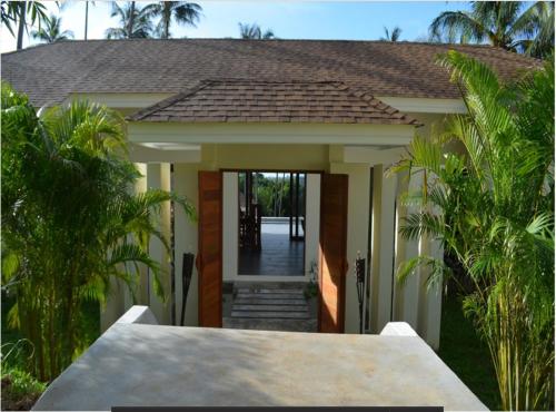 a house with a pathway leading to the front door at ORCHID LODGE SAMUI - Bed & Breakfast in Lamai