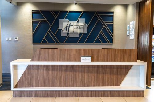 a lobby of a hotel with a reception desk at Holiday Inn Express & Suites - Ensenada Centro by IHG in Ensenada