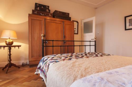 Katil atau katil-katil dalam bilik di B&B De Schiedamse Suites