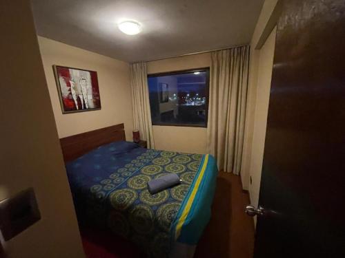 Postel nebo postele na pokoji v ubytování Departamento en Pucón ubicación privilegiada, 2 Habitaciones NRO WAP mas 569 dos uno 99 siete tres 32