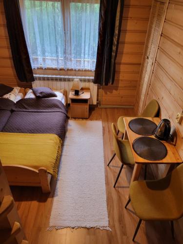 U Parów Sauna & Jacuzziにあるベッド