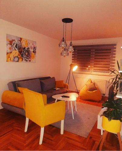Гостиная зона в Apartman M&S