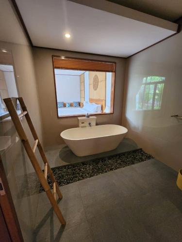 Vannituba majutusasutuses Sawitri Anandhita Luxury Villas