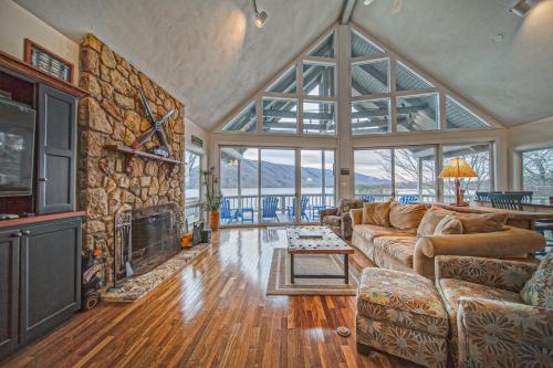 a living room with a couch and a fireplace at Our Point of View in Huddleston