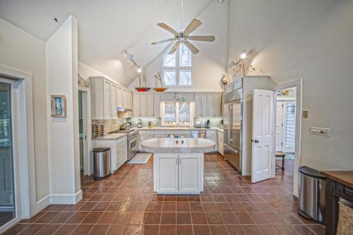 a large kitchen with a sink and a ceiling fan at Our Point of View in Huddleston