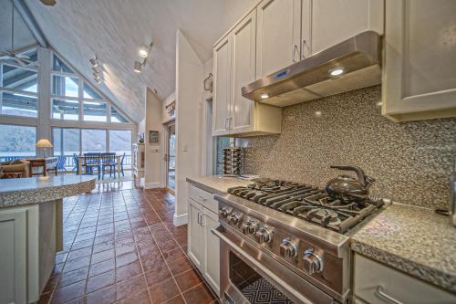 a kitchen with a stove and a counter top at Our Point of View in Huddleston